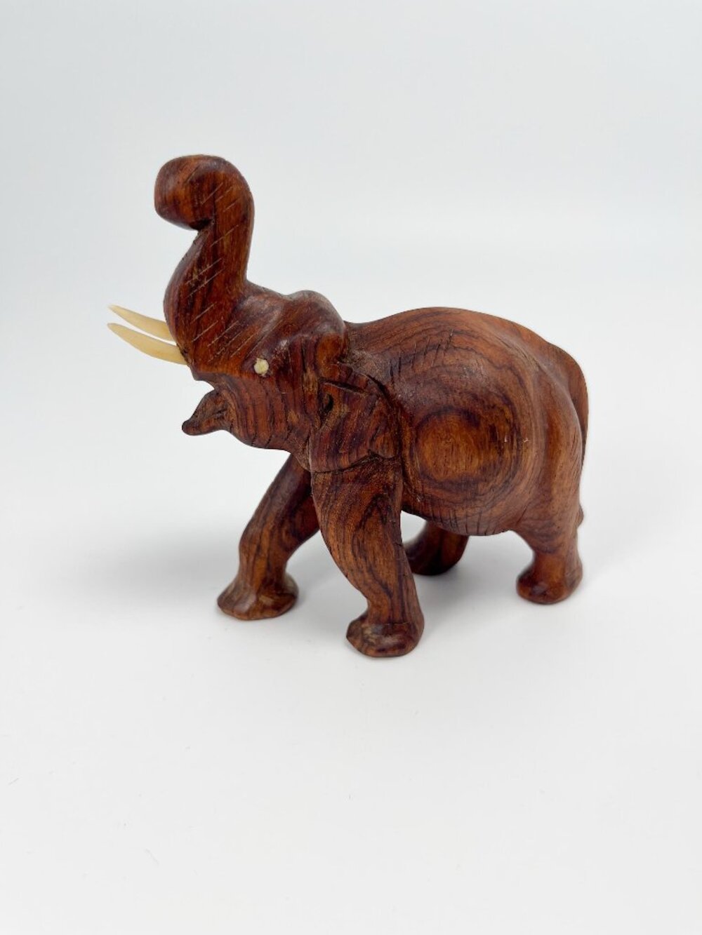 Vintage small 4" wood carved elephant